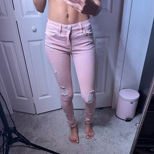 light pink jeans with rips